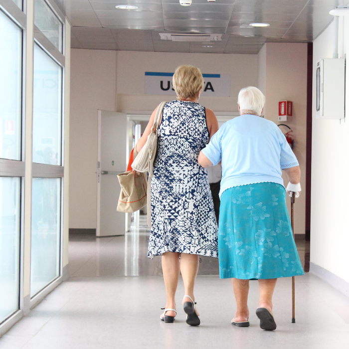 older consumer being walked by daughter