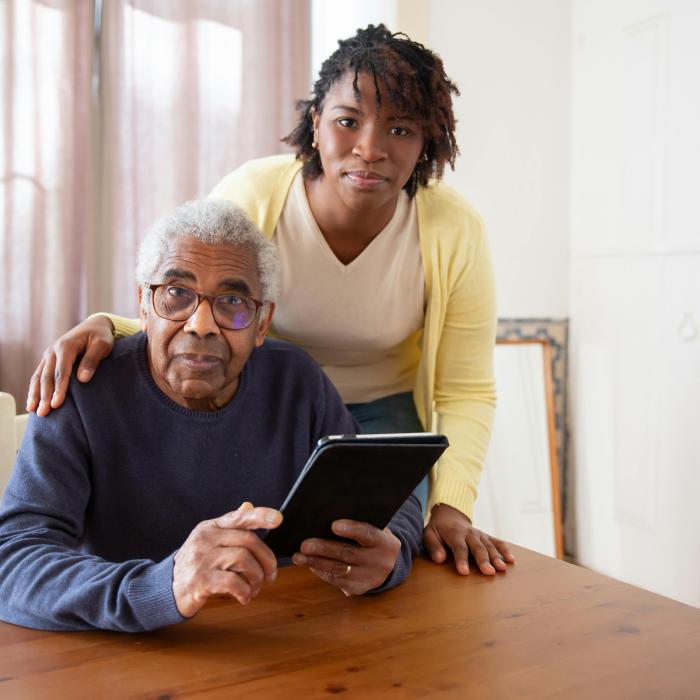 woman-caring-for-elderly-man